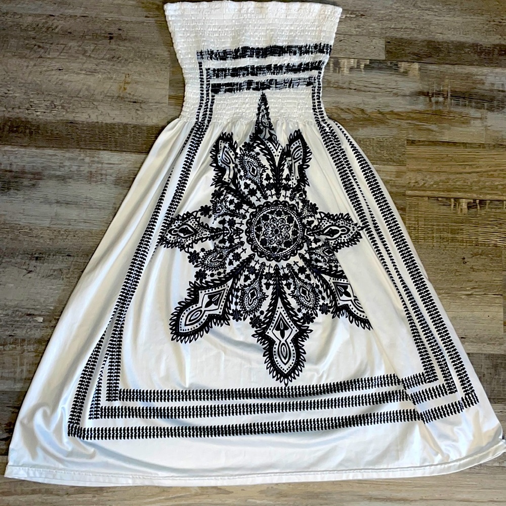scrunch dress with medallion on it